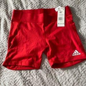Red spandex shorts